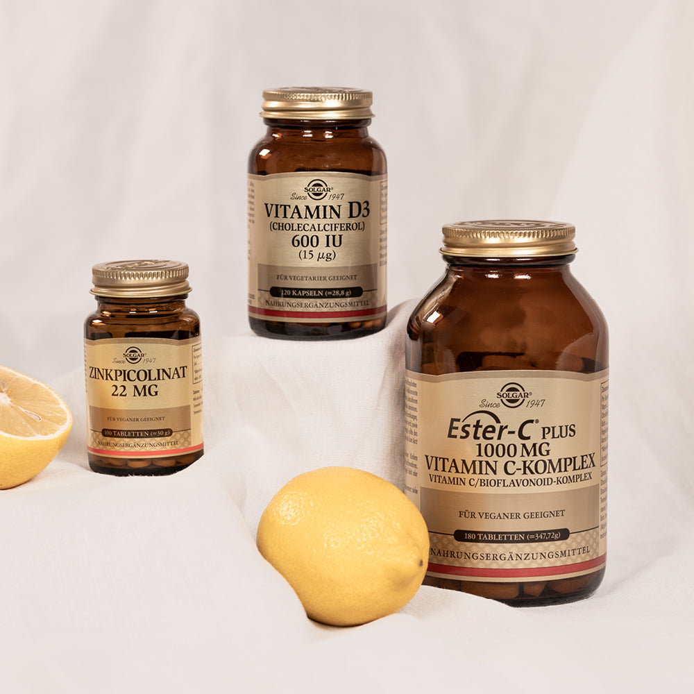 Solgar Vitamin D, Ester-C und Zink mit Zitronen